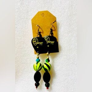 Black guitar pick earrings with green accent beads